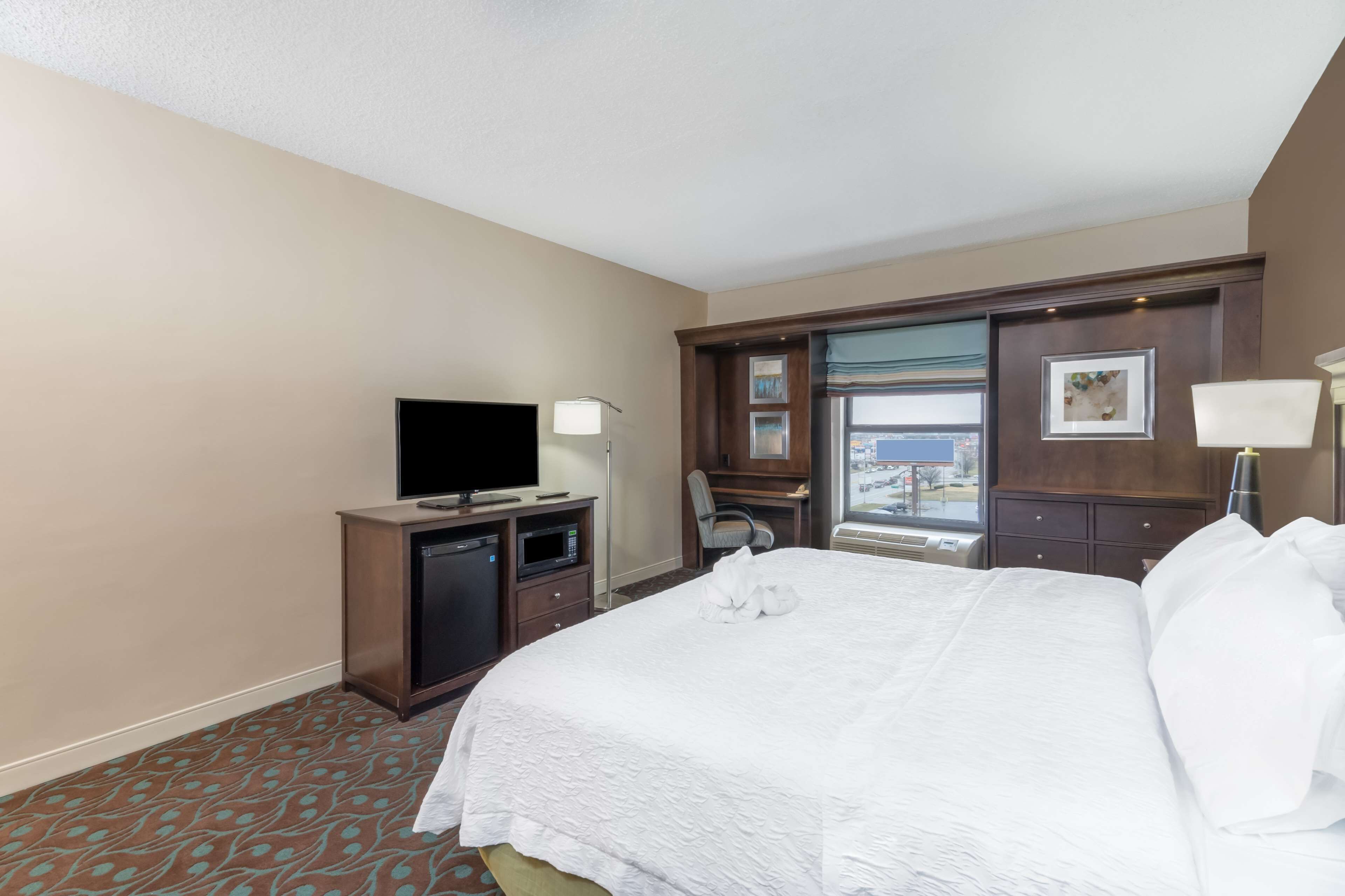 premium bedding, down duvets, desk, laptop workspace