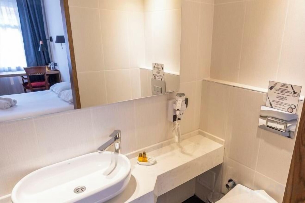 Bathroom | Shower, rainfall showerhead, designer toiletries, hair dryer