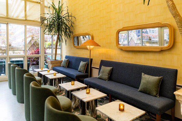 Rooftop bar, garden views, open daily