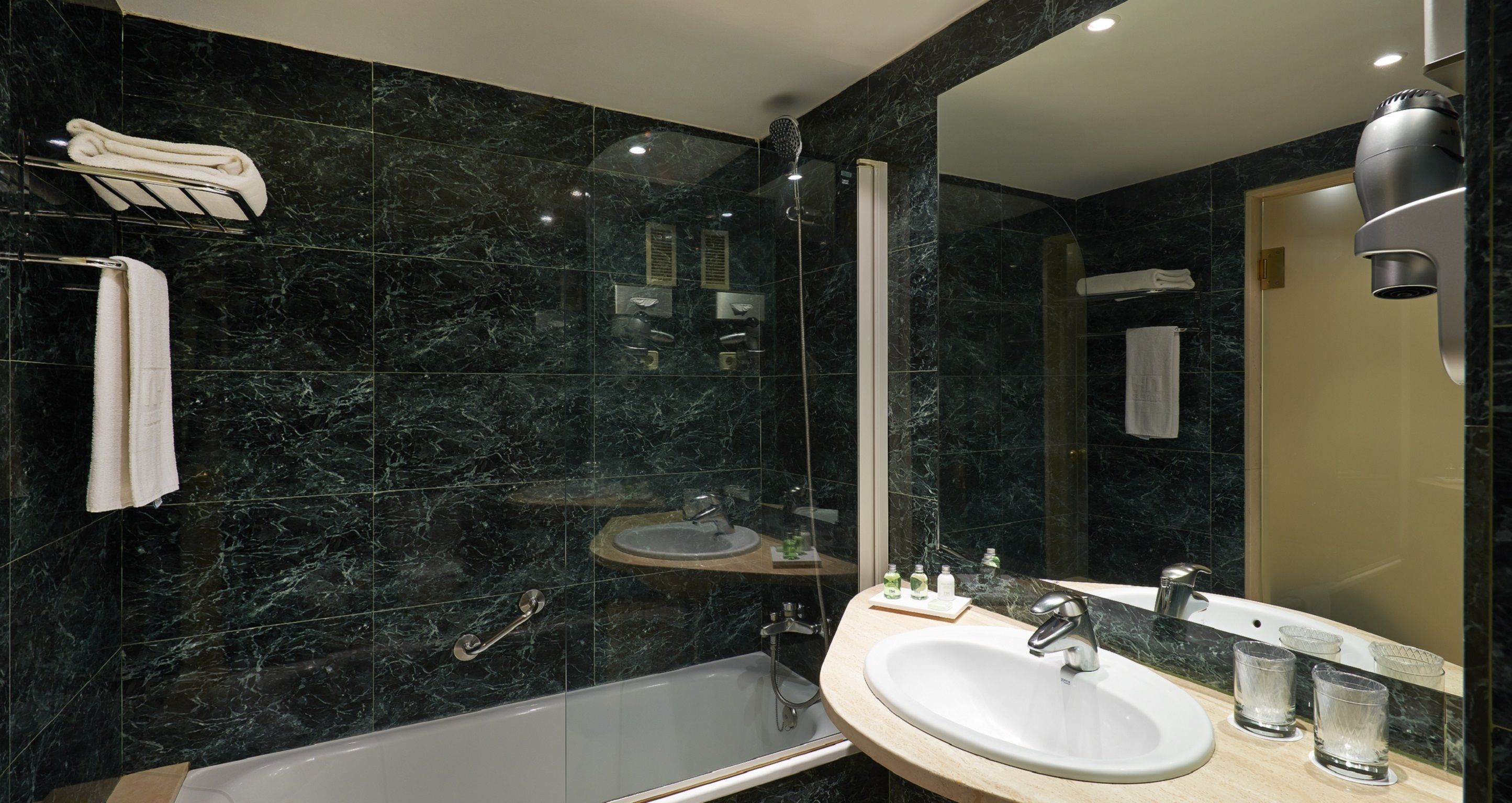 bathtub, free toiletries, hair dryer, bidet