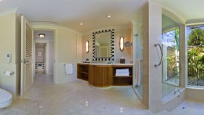 Combined shower/tub, deep soaking tub, designer toiletries, hair dryer
