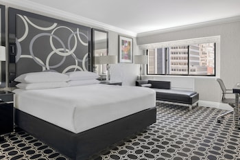 Frette Italian sheets, premium bedding, in-room safe, desk at The Muse New York
