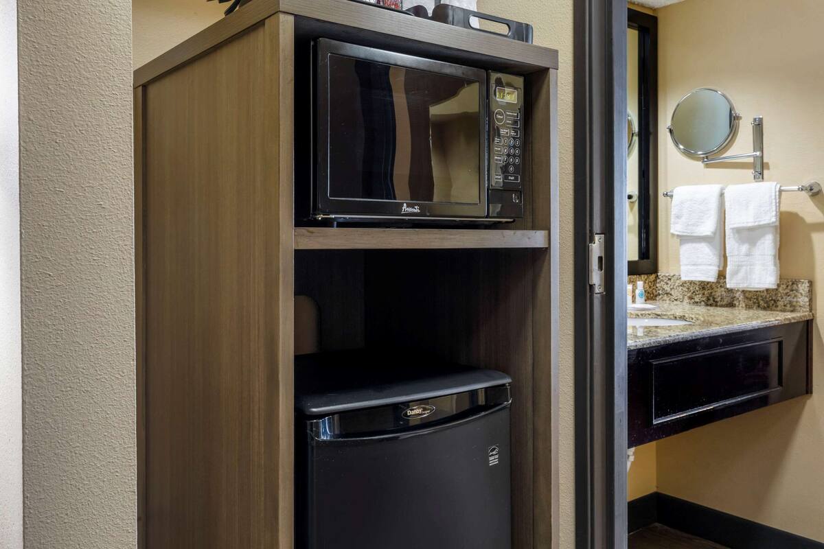 premium bedding, desk, laptop workspace, iron/ironing board