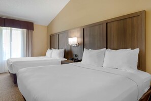 Premium bedding, desk, laptop workspace, iron/ironing board