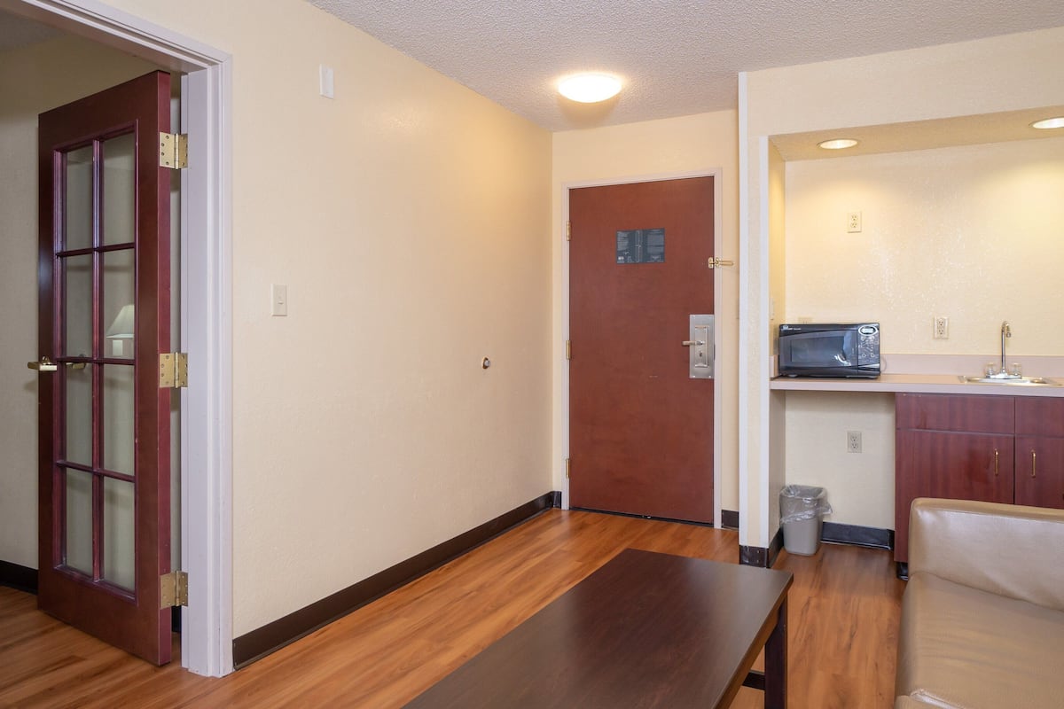 suite, 1 king bed, non smoking | desk, laptop workspace, blackout curtains, rollaway beds