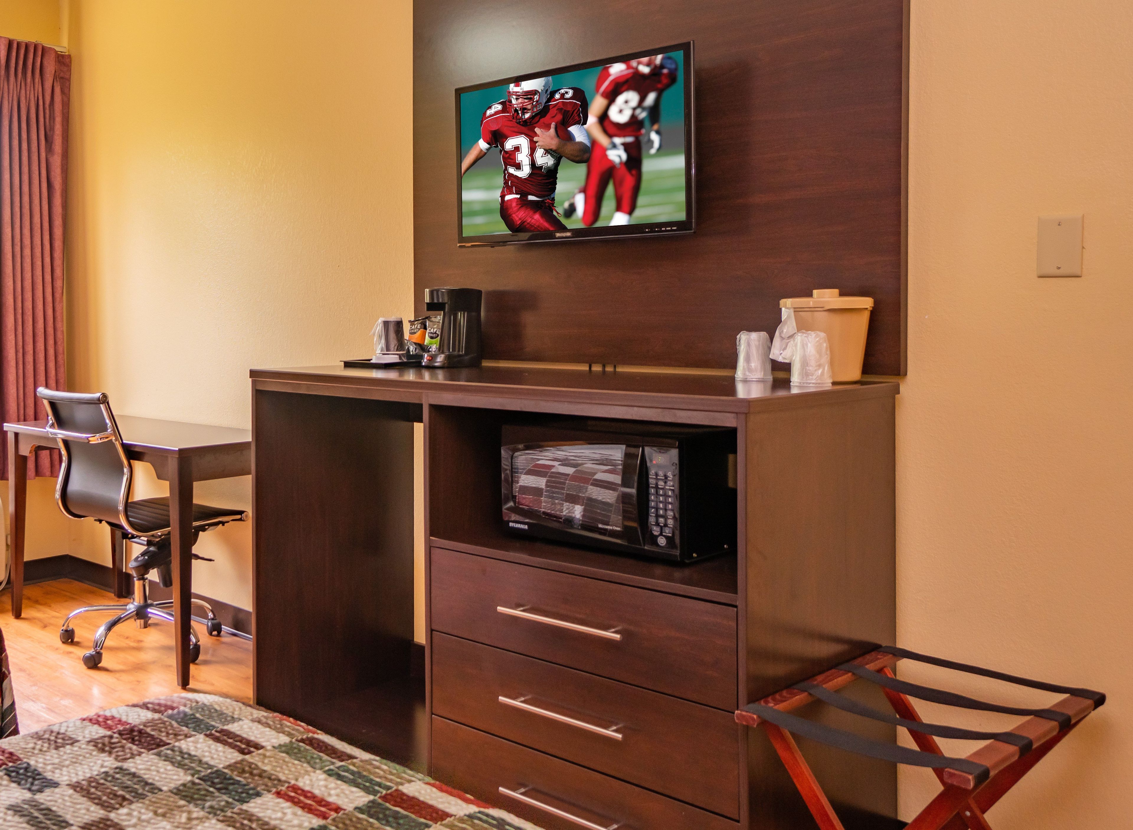 Desk, laptop workspace, blackout drapes, rollaway beds (surcharge)