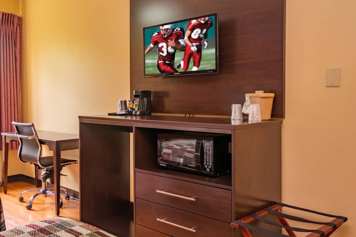 desk, laptop workspace, blackout curtains, rollaway beds