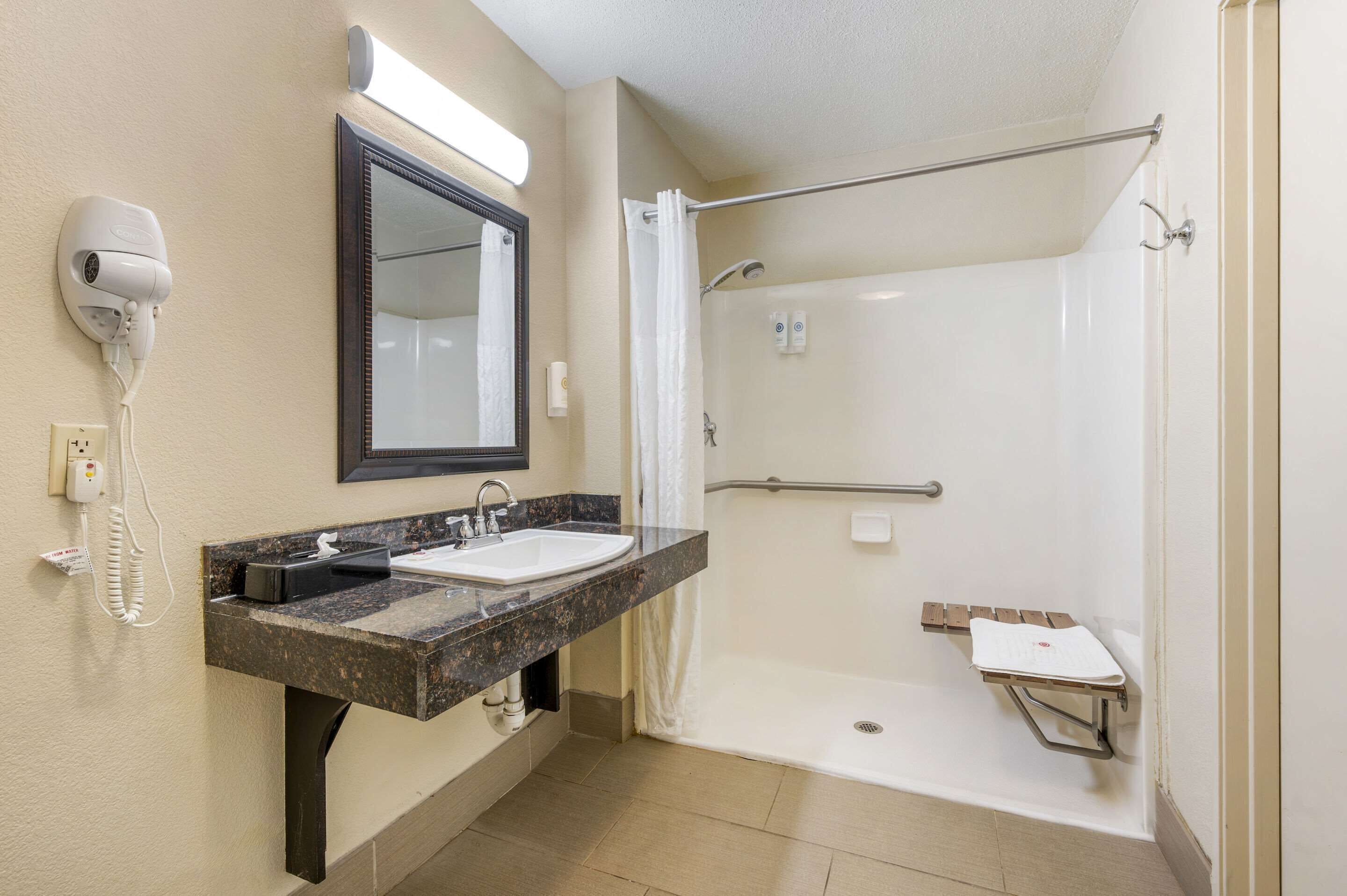 combined shower/bathtub, free toiletries, hair dryer, towels