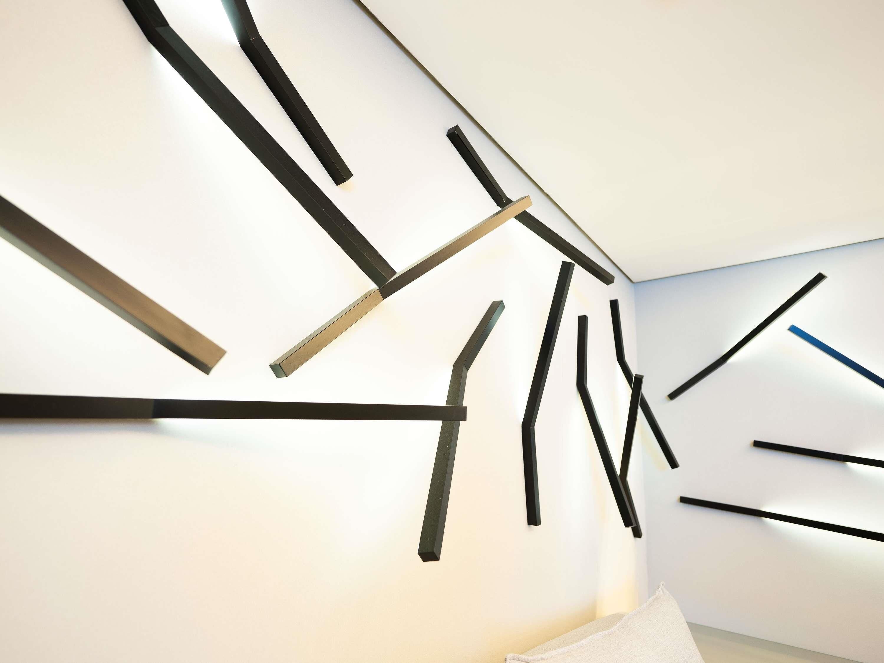 A modern interior with abstract wall art and a minimalist design.
