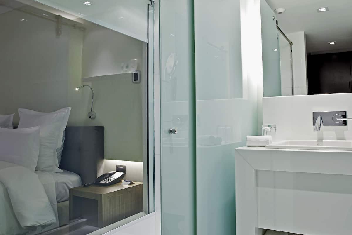 shower, eco-friendly toiletries, hair dryer, towels