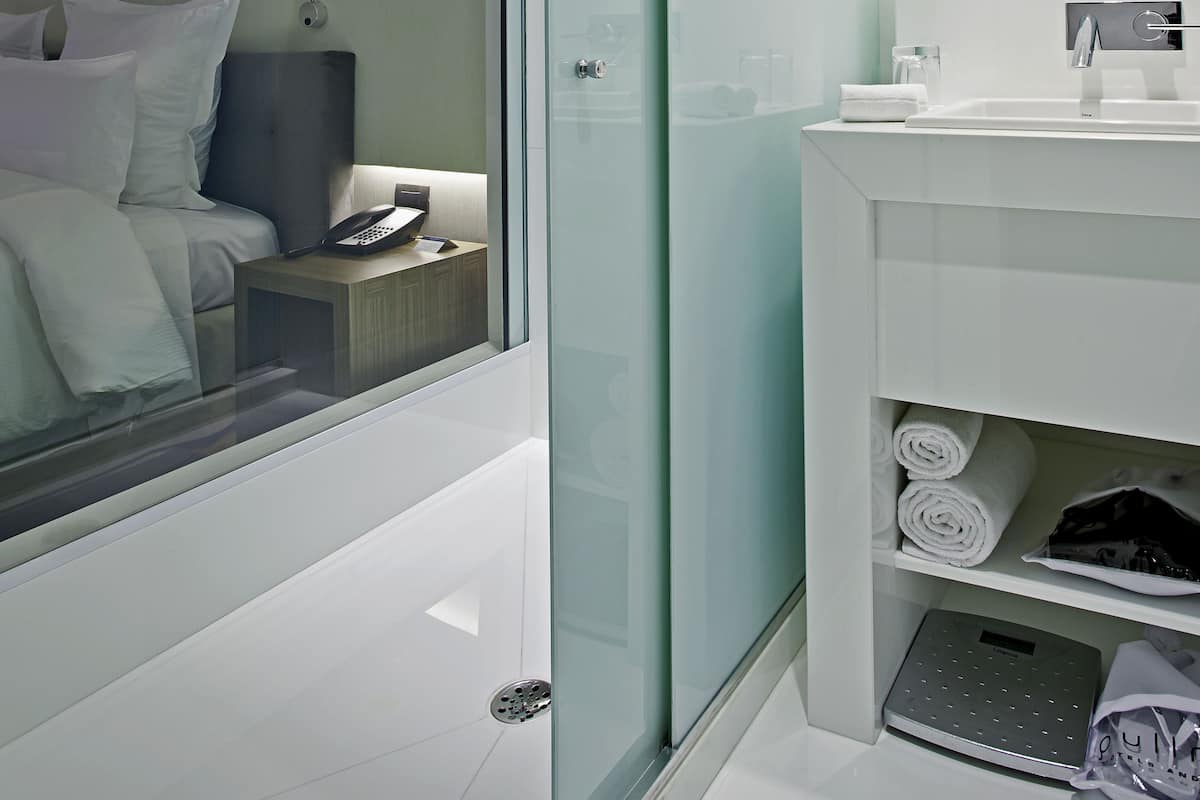 Shower, eco-friendly toiletries, hair dryer, towels