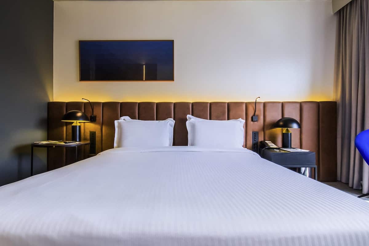 Ropa de cama de alta calidad y minibar