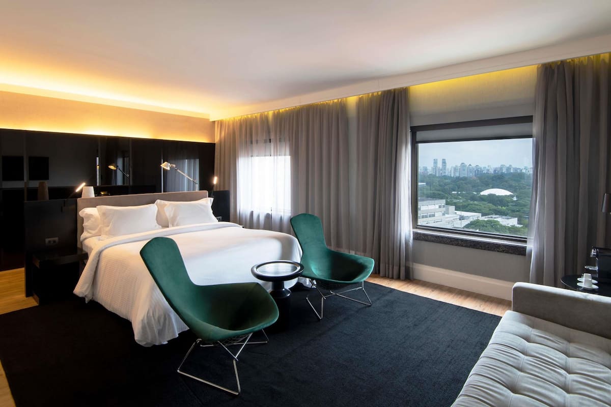 Suite ejecutiva, 1 cama Queen size, vista al parque | Ropa de cama de alta calidad y minibar