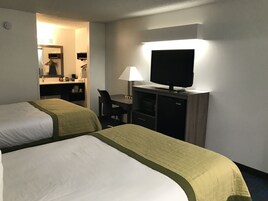 Desk, blackout drapes, iron/ironing board, free cribs/infant beds