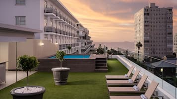 Outdoor pool, pool umbrellas, pool loungers