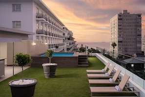 Outdoor pool, pool umbrellas, pool loungers
