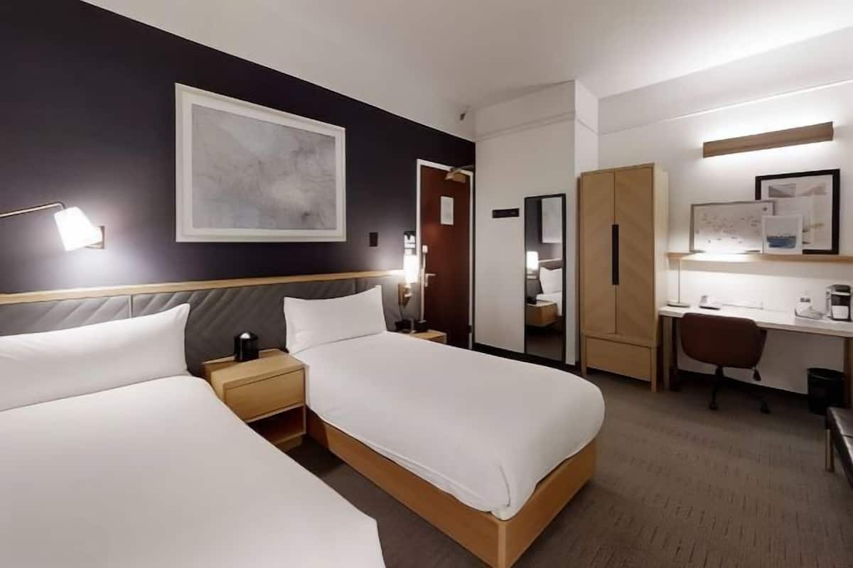 Premium bedding, desk, laptop workspace, free WiFi