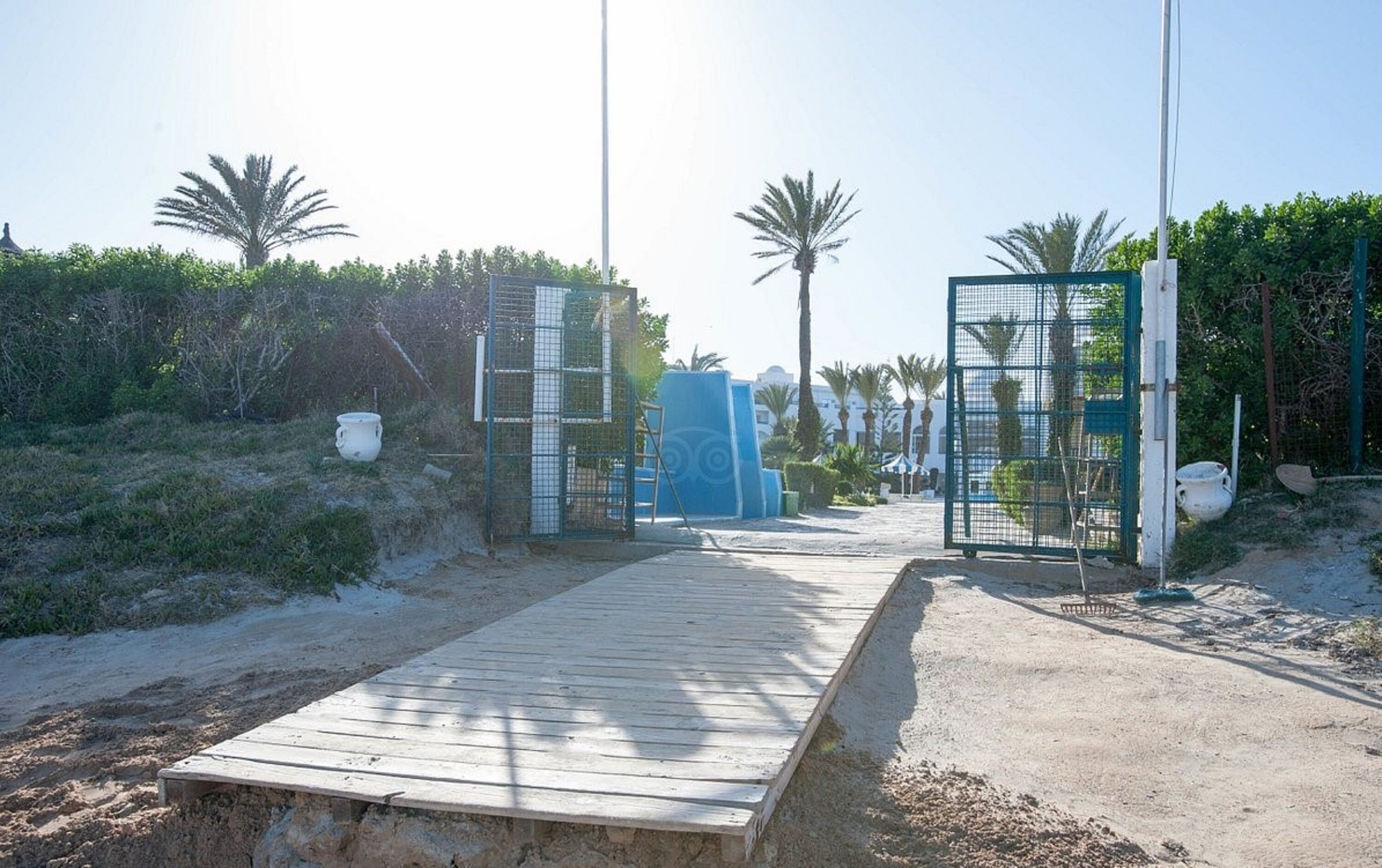 on the beach, sun-loungers, beach umbrellas, beach volleyball