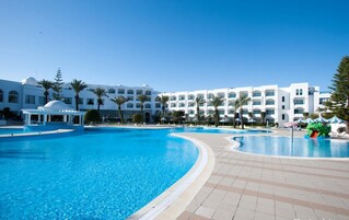 Indoor pool, outdoor pool, pool umbrellas, sun loungers