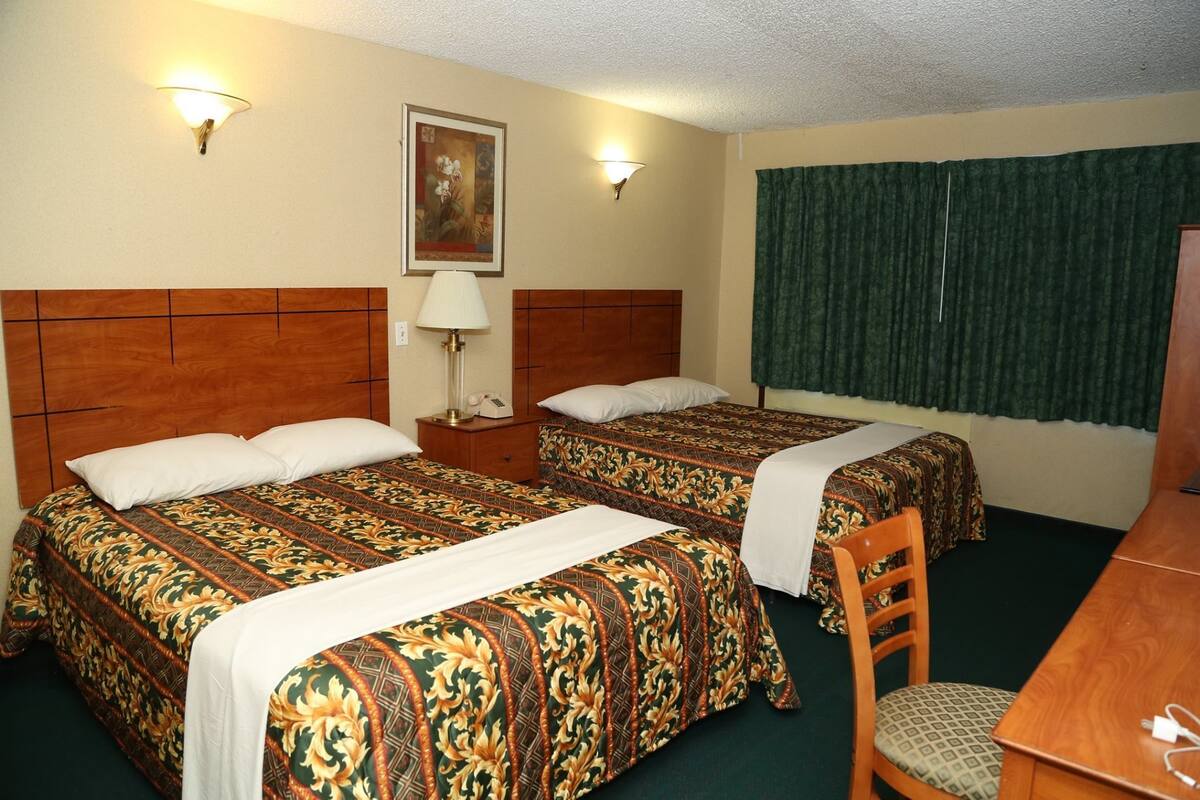 Hypo-allergenic bedding, in-room safe, blackout curtains