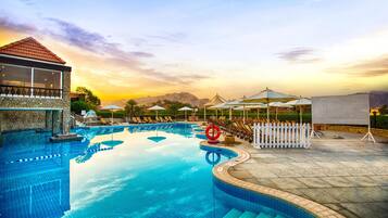 2 outdoor pools, open 8:00 AM to 8:00 PM, pool umbrellas, sun loungers