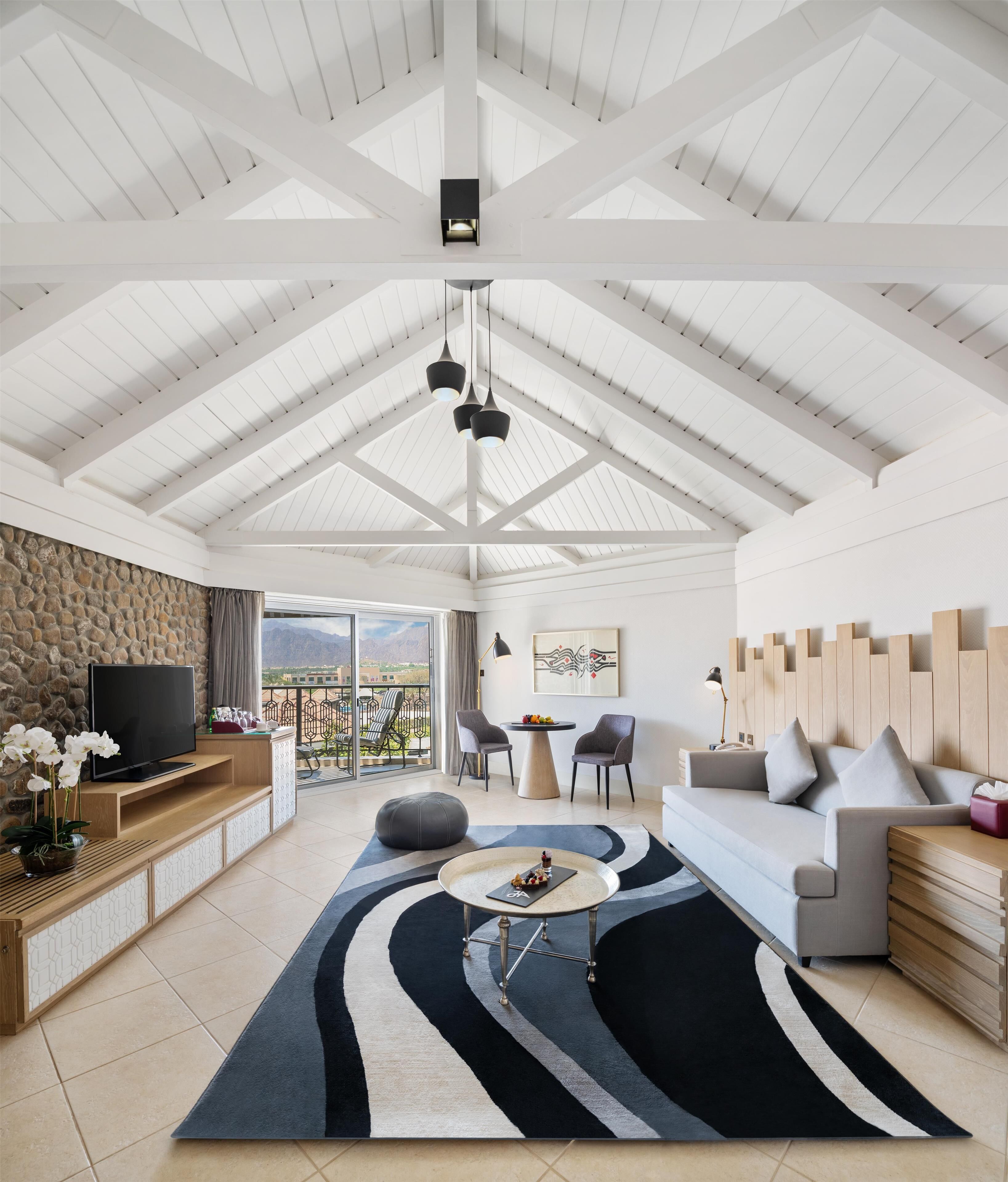 family room, balcony, mountain view (deluxe) | premium bedding, down duvets, minibar, in-room safe