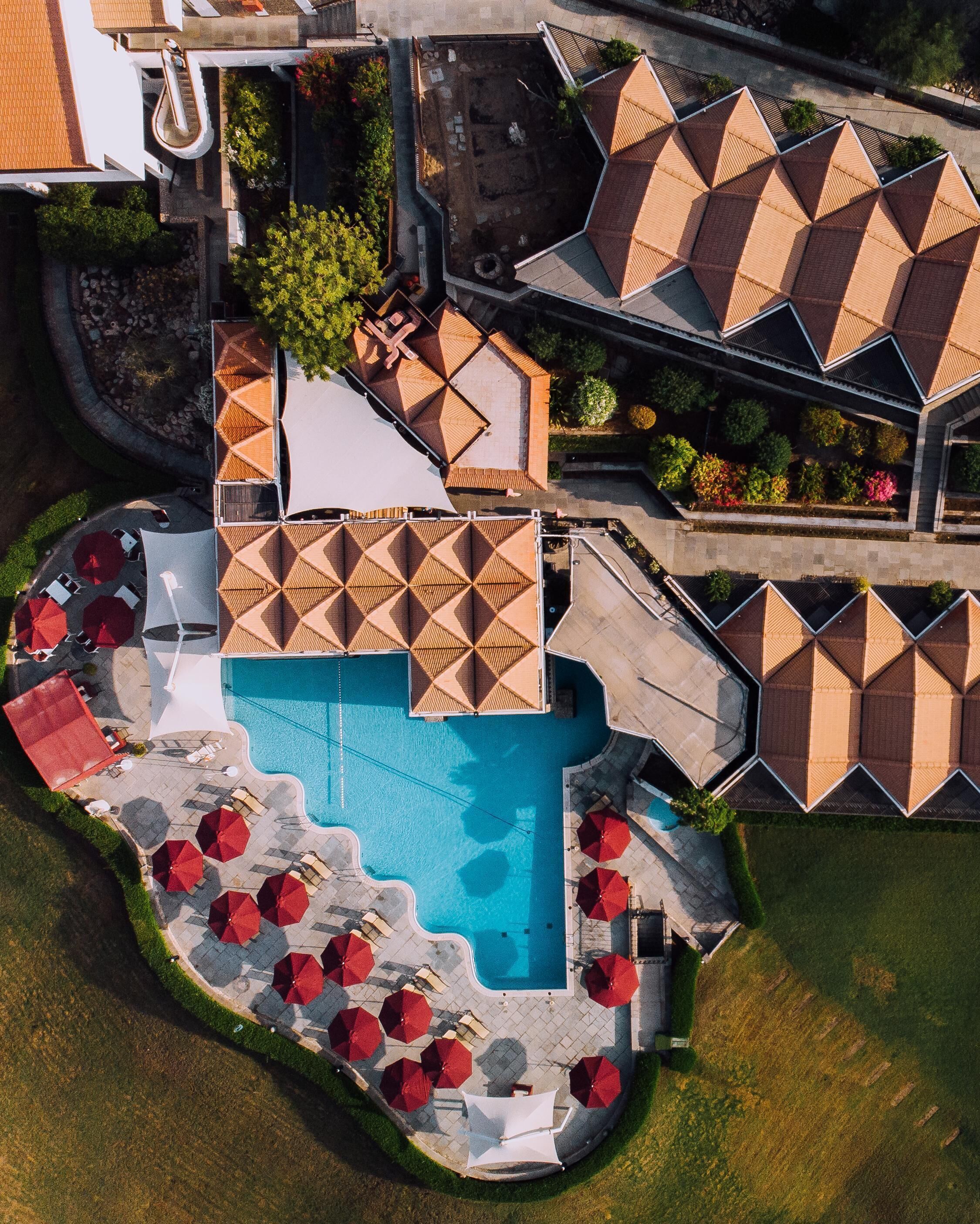 2 outdoor pools, open 8:00 AM to 8:00 PM, pool umbrellas, pool loungers