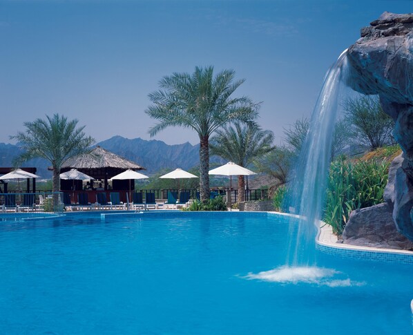 2 outdoor pools, open 8:00 AM to 8:00 PM, pool umbrellas, pool loungers