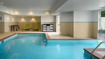 Indoor pool, outdoor pool, pool umbrellas, pool loungers
