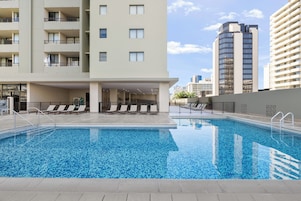 Outdoor pool, open 8:00 AM to 10:00 PM, sun loungers