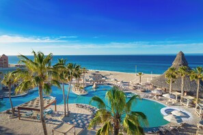 On the beach, sun loungers, beach umbrellas, beach towels