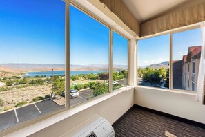Standard Room, 1 King Bed, Non Smoking, Jetted Tub (Larger Room) | In-room safe, desk, blackout drapes, iron/ironing board