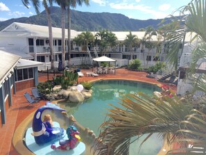Outdoor pool, pool umbrellas, sun loungers
