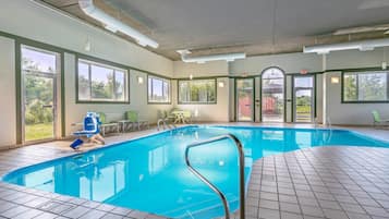 Indoor pool, open 6:00 AM to 10:00 PM, pool loungers