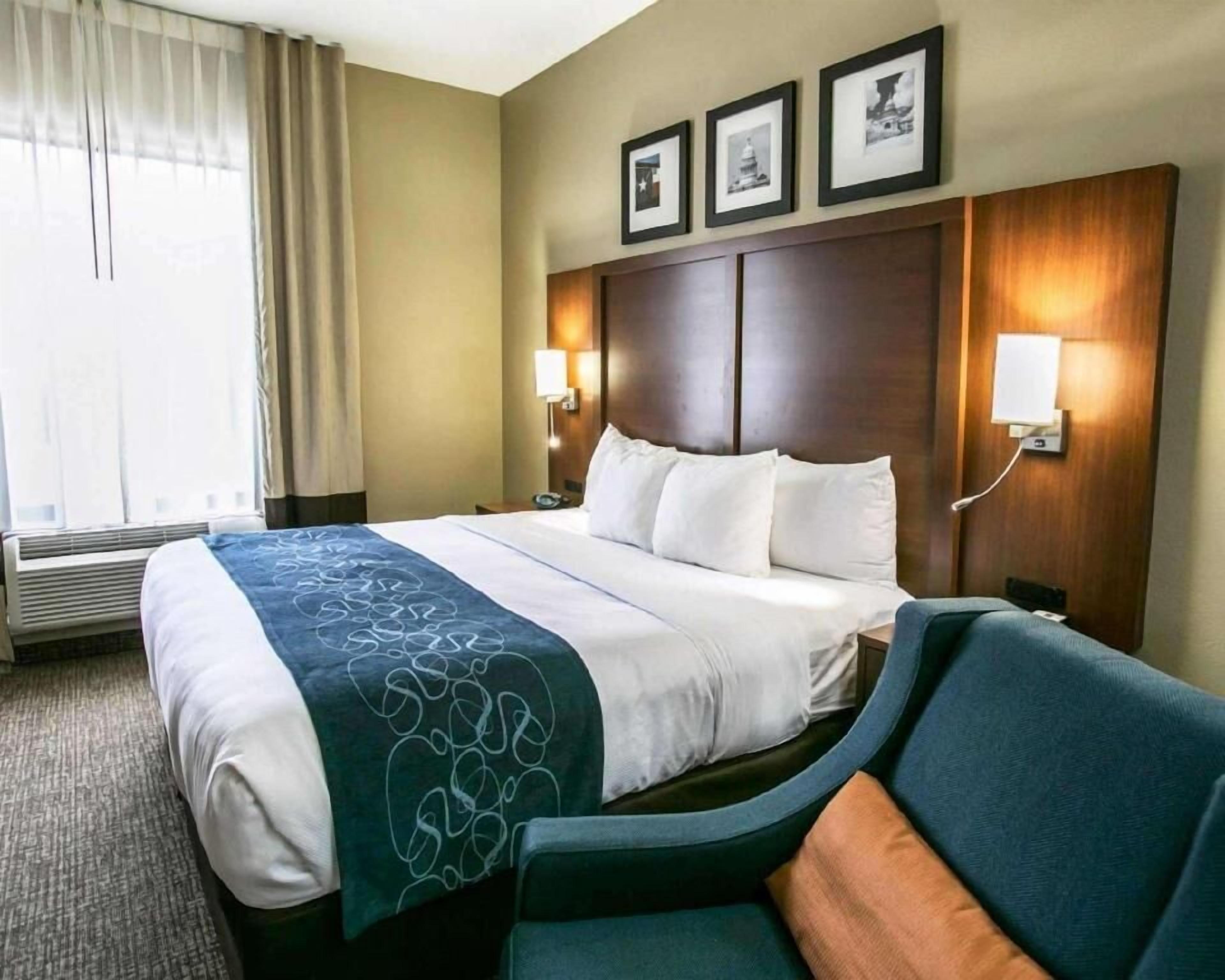 Pillow-top beds, desk, blackout curtains, iron/ironing board