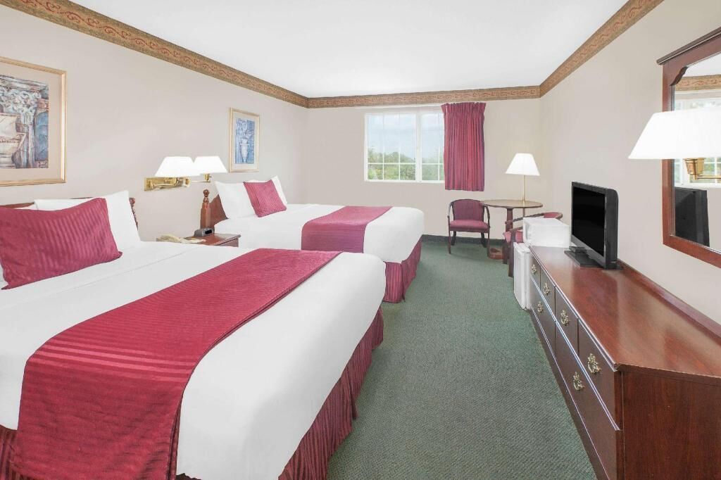 Premium bedding, blackout drapes, iron/ironing board, rollaway beds