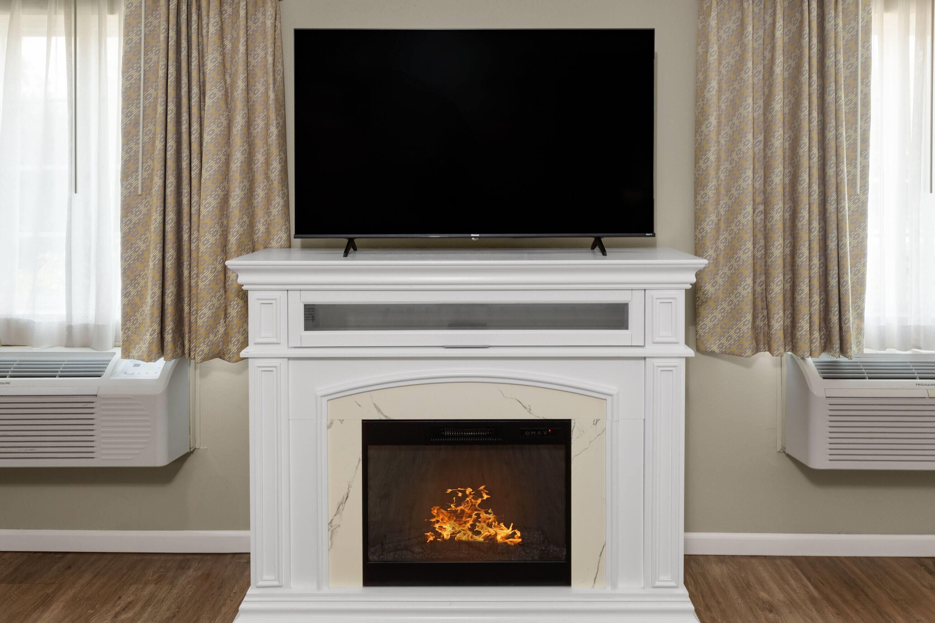 Premium bedding, blackout drapes, iron/ironing board, rollaway beds