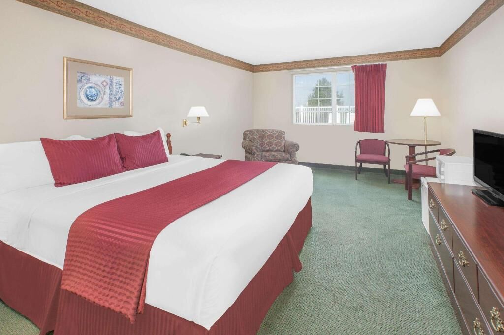 Premium bedding, blackout drapes, iron/ironing board, rollaway beds