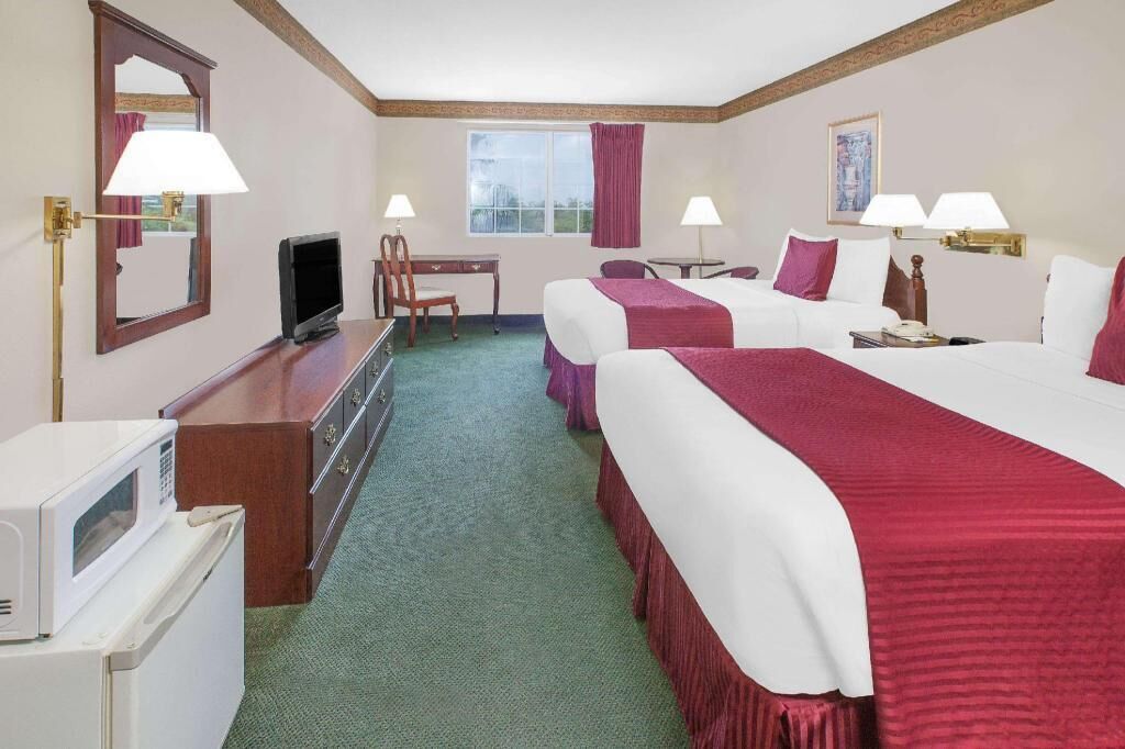 Premium bedding, blackout drapes, iron/ironing board, rollaway beds