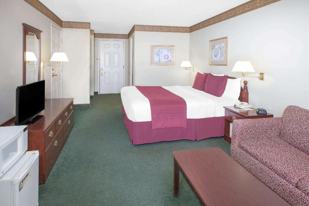 Premium bedding, blackout drapes, iron/ironing board, rollaway beds
