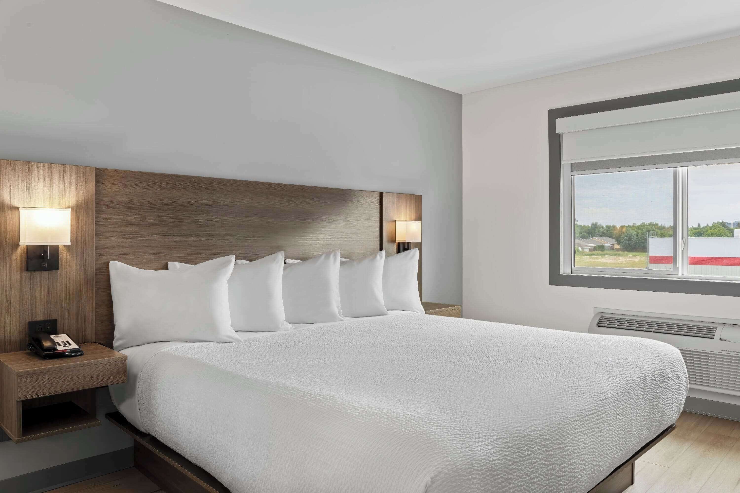 suite, 1 king bed with sofa bed, non smoking, kitchenette | pillow-top beds, individually decorated, individually furnished, desk