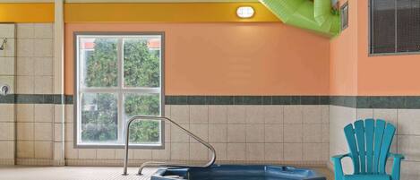 Indoor pool, open 9:00 AM to 11:00 PM, pool loungers