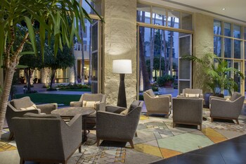 Sitting area in hotel lobby at Tempe Mission Palms, a Destination by Hyatt Hotel