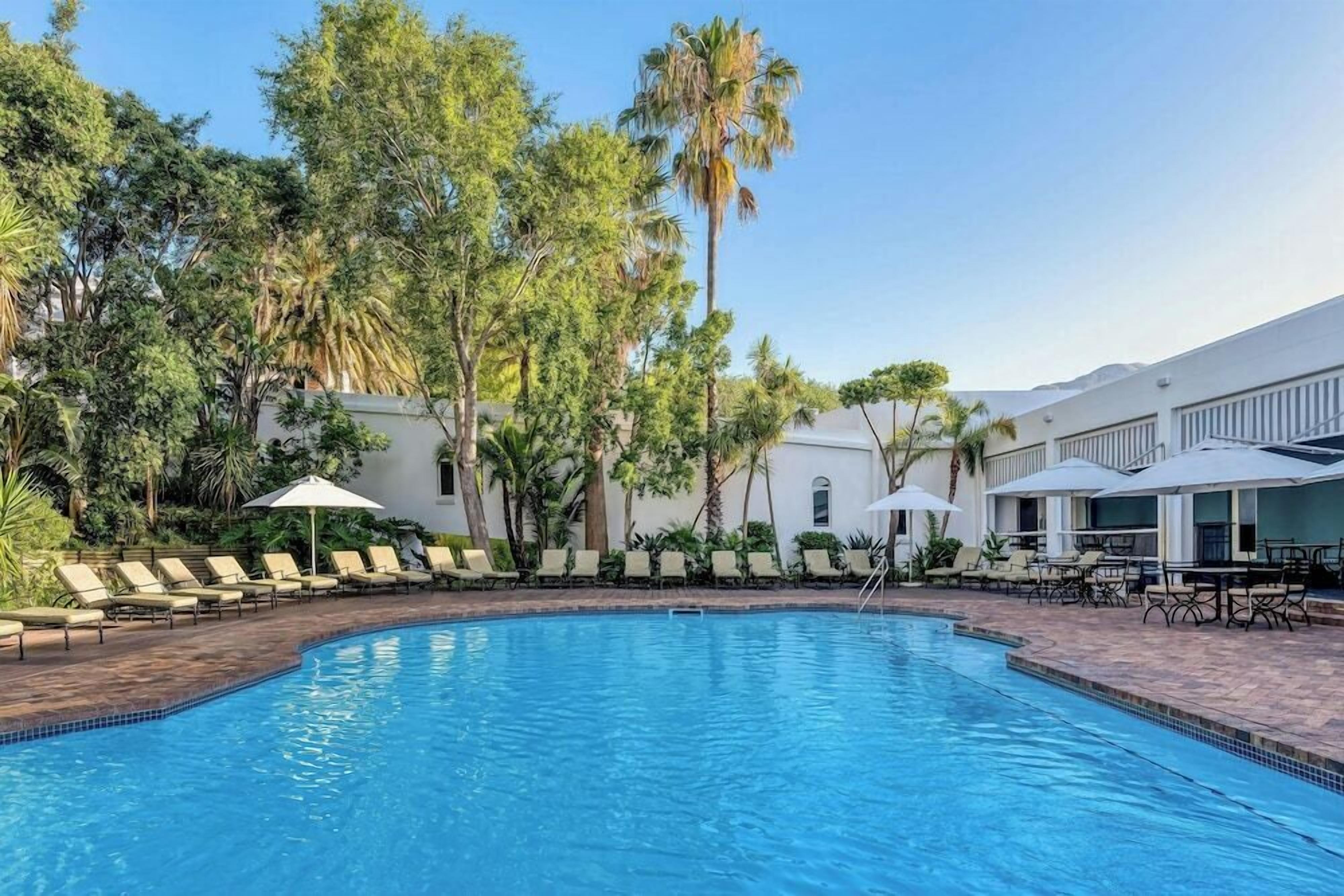 2 outdoor pools, pool umbrellas