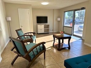 Classic Apartment, Multiple Beds | Living area | Flat-screen TV