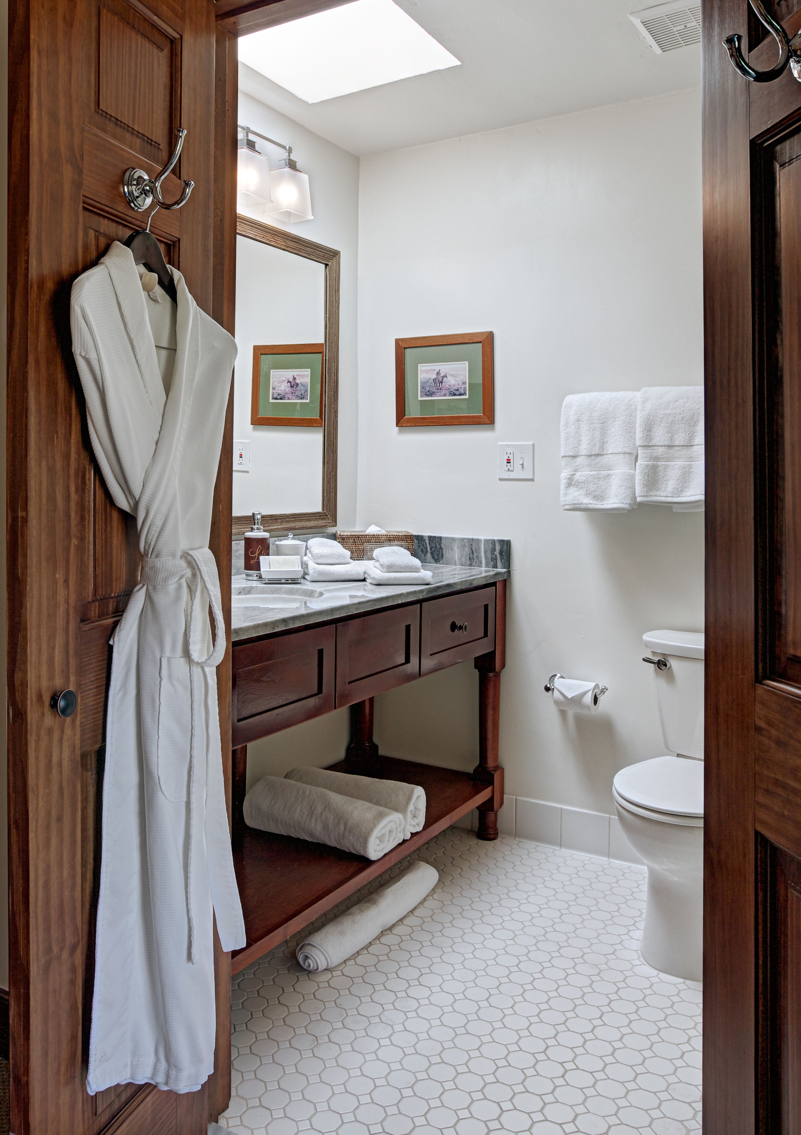 designer toiletries, hair dryer, bathrobes, towels