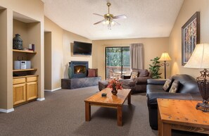 Standard Condo, 1 Bedroom, Kitchen | Living area | LCD TV