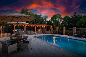 Outdoor pool, open 7:00 AM to 10:00 PM, cabanas (surcharge)