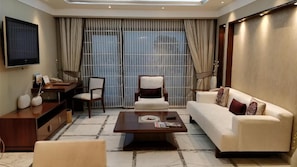 Suite, Balcony | City view