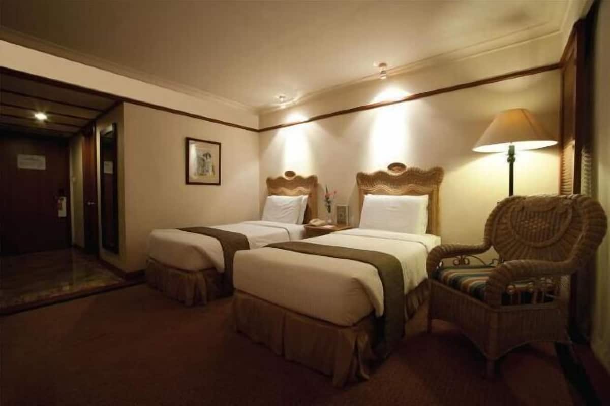 Ropa de cama de alta calidad y minibar 